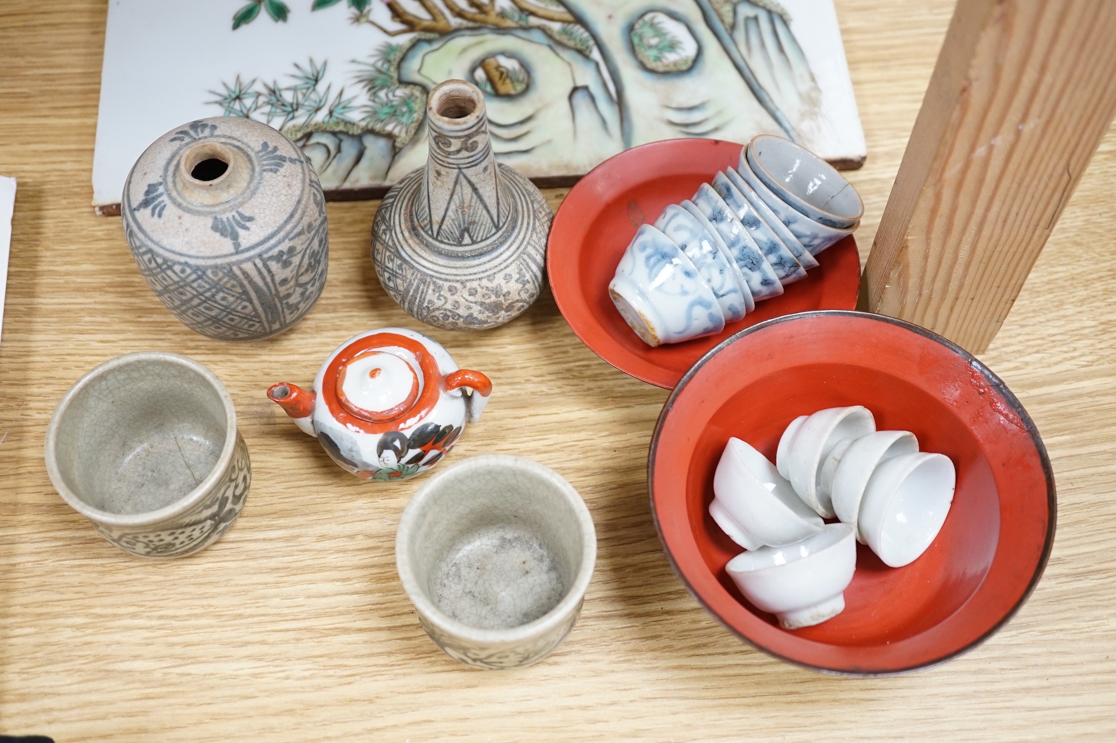 A Chinese porcelain plaque, 36 x 27.5cm, two Thai small vases and cups, porcelain tea bowls, teapot etc